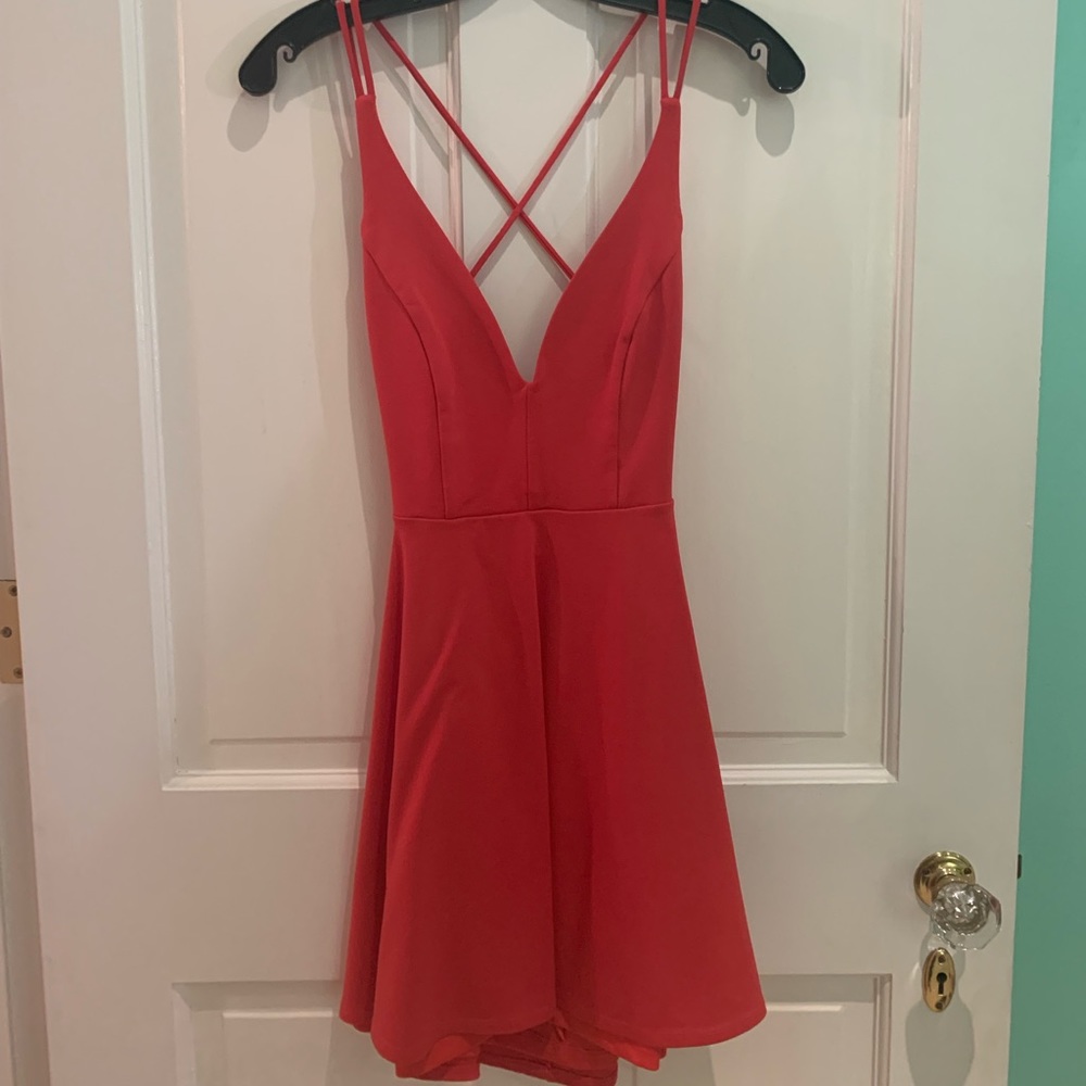 Orangey-red strappy fit and flare dress